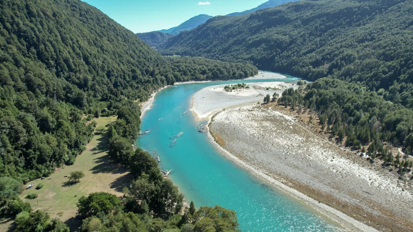 Rio Puelo riverfront property, aerial view of turquoise glacial river